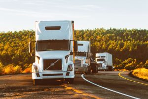 A line of commercial trucks involved in an accident